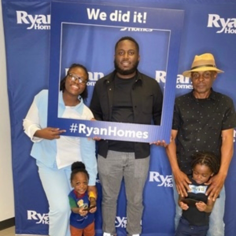 Family celebrating new home purchase with Ryan Homes